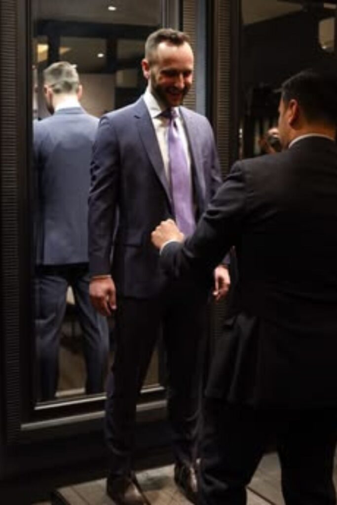 a man shopping for a wedding suit