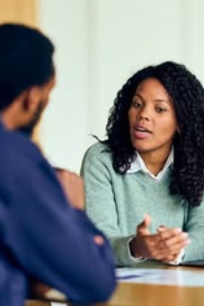 someone explaining something to another person