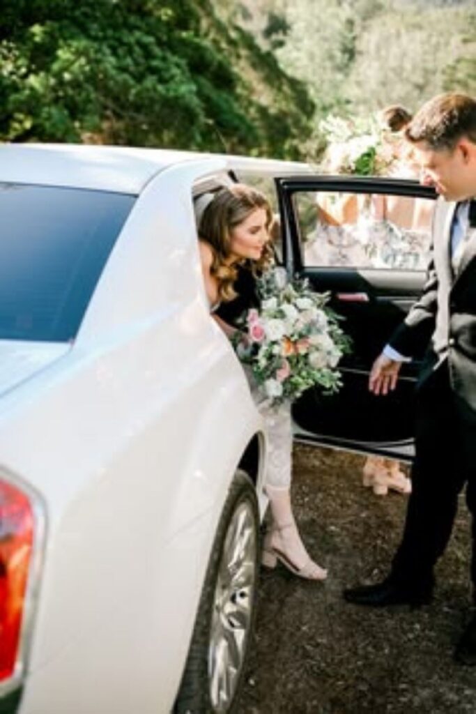 wedding guests in a car