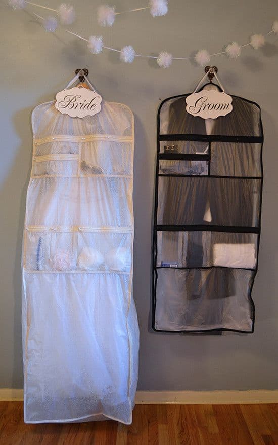 Couples Wedding outfit packed in a garment bag.
