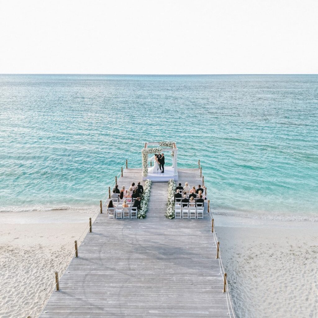  Powder white sand ceremony setup, one of the calmest dream destination wedding locations in the Caribbean.