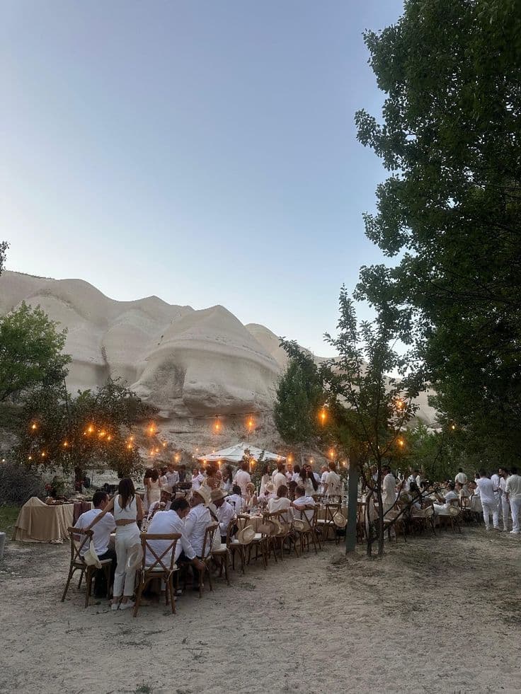 Red light lit wedding overlooking a mountain view